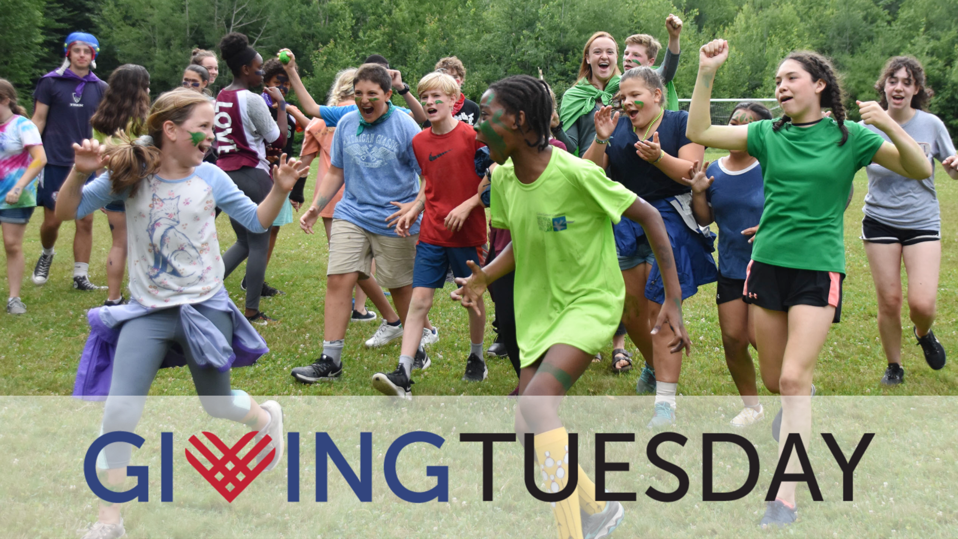 kids running with a giving tuesday logo